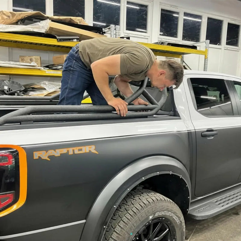 Checking the fit of the roll bar on the truck